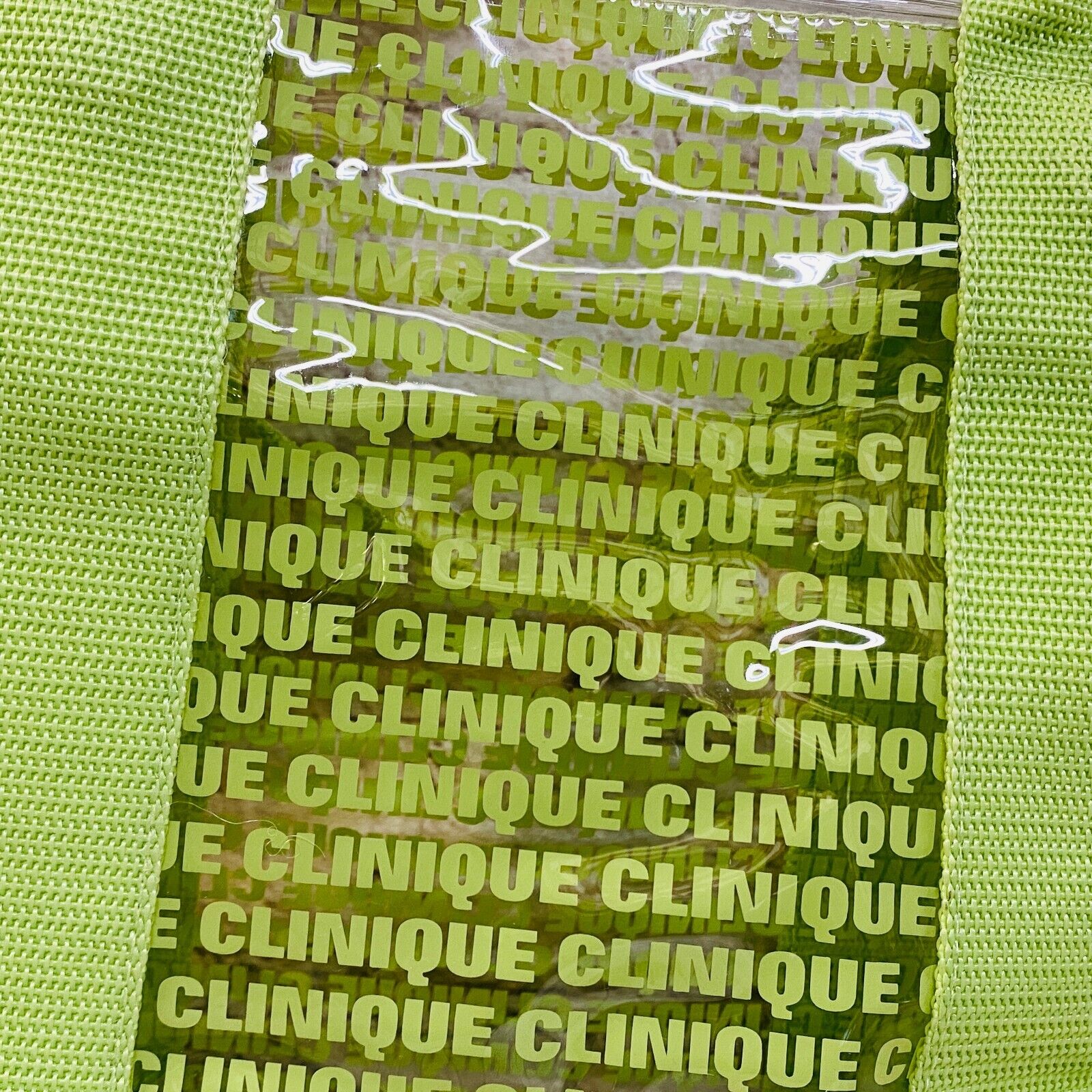 CLINIQUE GREEN CLINIQUE LOGO IMPRINTED CLEAR VINYL BAG - NEW