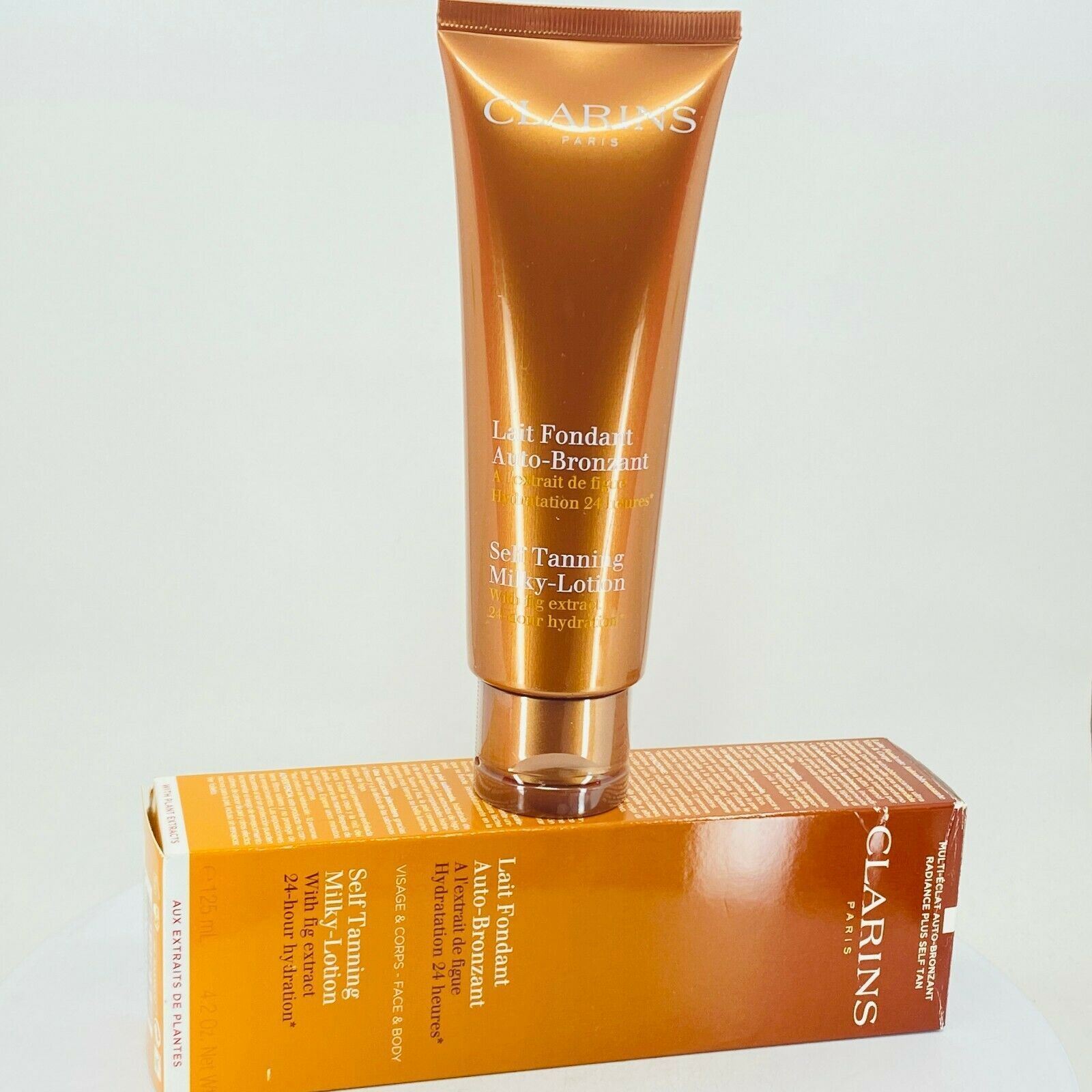 Clarins Self Tanning Milk Lotion With Fig Extract Face and Body - 4.2 oz - NIB