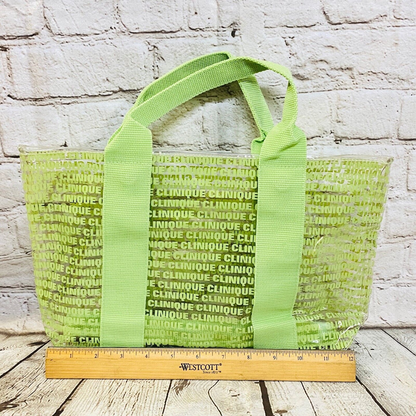 CLINIQUE GREEN CLINIQUE LOGO IMPRINTED CLEAR VINYL BAG - NEW